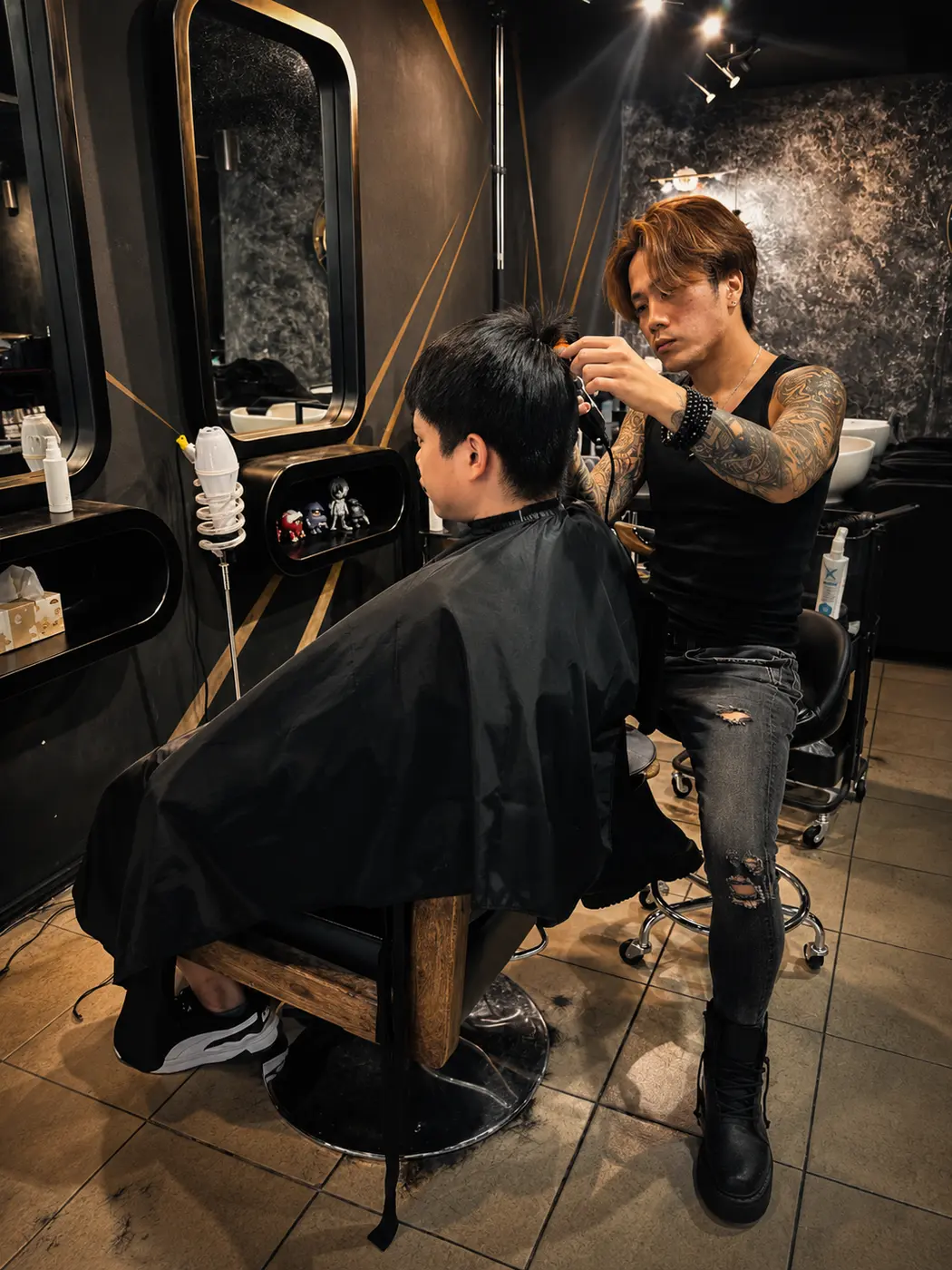 Stylist cutting a client's hair at Mars Hair, a hair salon in Sydney CBD on George Street